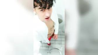 Jerk off at spa toilet in bathrobe before the pool