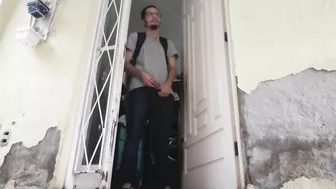 boy wearing jeans peeing out before going outside