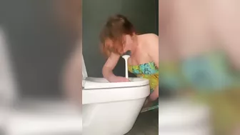 Licking public toilets in the hotel and playing with toilet brush