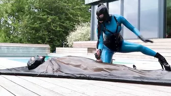 Cristal Kinky in latex catsuit handjob and fucking bound sub in latex vacbed Preview