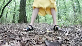 Cute girl pissing in the forest