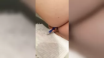 Arab writing the name with a pencil in the ass