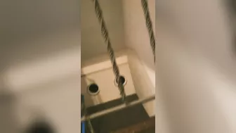 Risky dildo fuck in the Airbnb stairwell