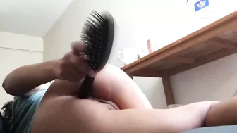 Small girls fucks a hair brush