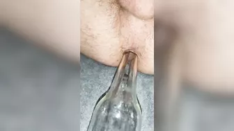 Bottle Glass in his ass