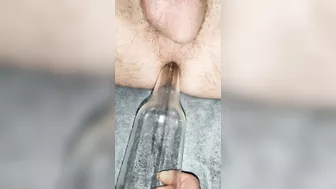 Bottle Glass in his ass