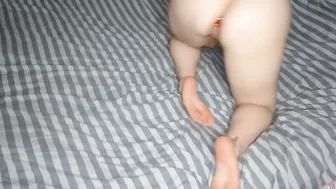 showing legs, bound hands and a plug in the ass