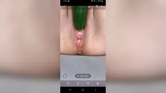 Ftm masturbates hairless noisy pussy with a cucumber close up.