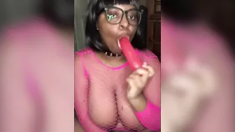 Nerdy Busty Ebony Babe Sucking on a Dildo