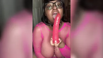 Nerdy Busty Ebony Babe Sucking on a Dildo