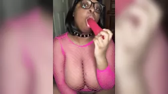 Nerdy Busty Ebony Babe Sucking on a Dildo