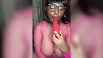 Nerdy Busty Ebony Babe Sucking on a Dildo