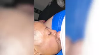 Dicksucker giving blowjob while I smoke