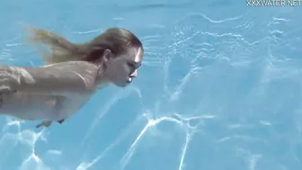 Finnish blonde tattooed pornstar Mimi underwater