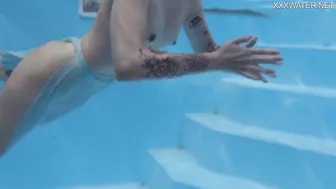 Finnish blonde tattooed pornstar Mimi underwater