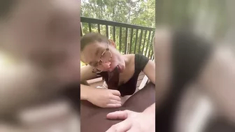 She gives sloppy BBC on the balcony until I nut