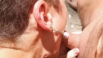 Blowjob at the naked beach