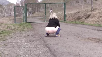 Pissing on a public road outdoors. Voyeur watching mature milf with big butt in white panties. Dirty fetish. ASMR. PAWG.