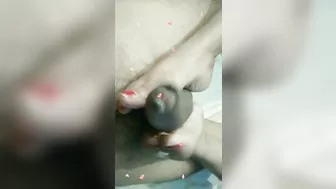 She plays with feet and makes him cum