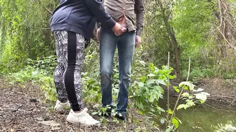 MILF in leggings helps a stranger pee by the lake