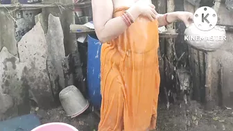 Anita yadav bathing outside with hot