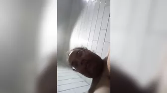 Pigslut plays with belly and pussy in Walmart bathroom