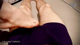 Foot massage on cock and balls