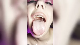 Mouth teasing. Sloppy girl with braces