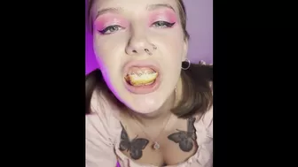 Food crush. Girl with braces chewing food