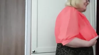 Huge tits in tight orange blouse