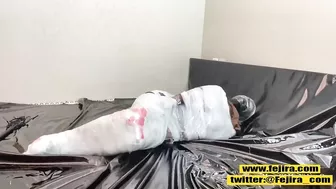 Fejira com Fetish girl mummification wrap