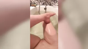 Shy girl in the bathtub showing off clean shaved pussy - modest traditional girl on homemade video