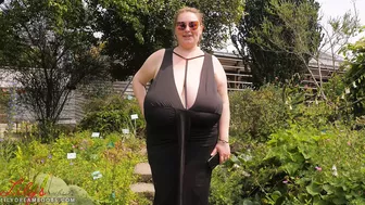 Walking braless in city garden