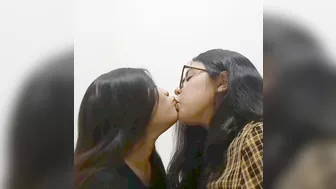 Real lesbian couple kissing