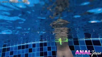 Asian Girl Swims with Big Butt Plug