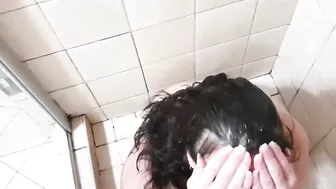 Girl washing her hair and body with piss