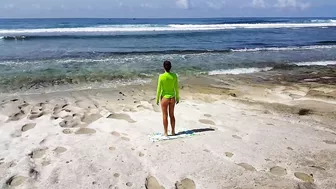 Naked YOGA # Morning Yoga exercises at Ocean Shore