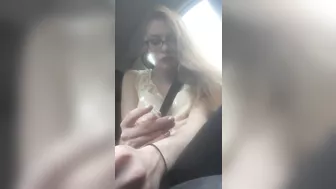 Beautiful junkie doing a shot in the car