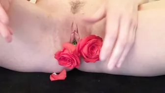 I'm mastrubating with two roses inside my tight horny pussy