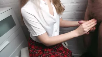 Schoolgirl gives her boyfriend a quick handjob and he cums on her blouse