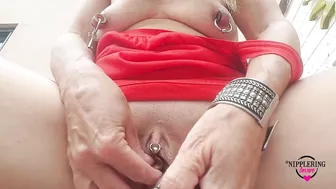 nippleringlover inserting heavy padlock in stretched labia piercings outdoors - pierced tits & pussy