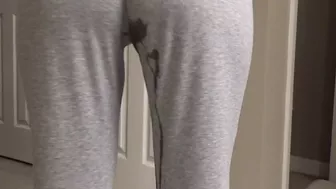 PISSING HER PANTS!!! HOT MILF CAN'T HOLD HER PEE!!!