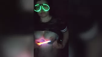 Fucking my mouth and pussy with glow sticks