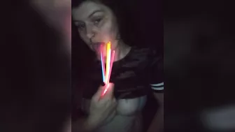 Fucking my mouth and pussy with glow sticks