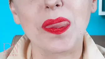 Red lipstick kissing teasing by Regina Noir.