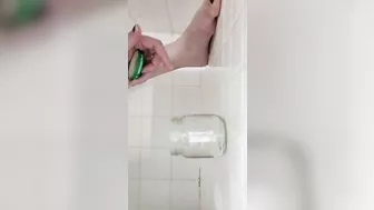 Milf pissing into jar