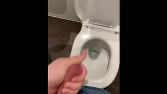 Wanking off in public cubicle with big cumshot at the end