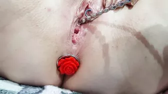 Sounding masturbation of a pierced pussy with an anal plug