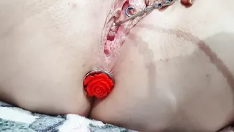 Sounding masturbation of a pierced pussy with an anal plug