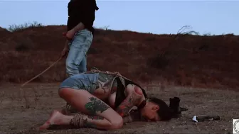 Inked sexy desert bound sub awaits earthly domination pleasure and flogging then rims her powerful doms ass